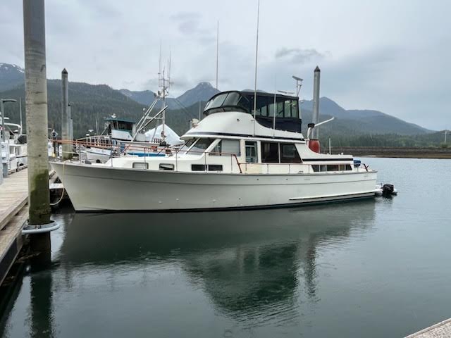 Trawler yacht at anchor in Southeast Alaska during pre-purchase survey.